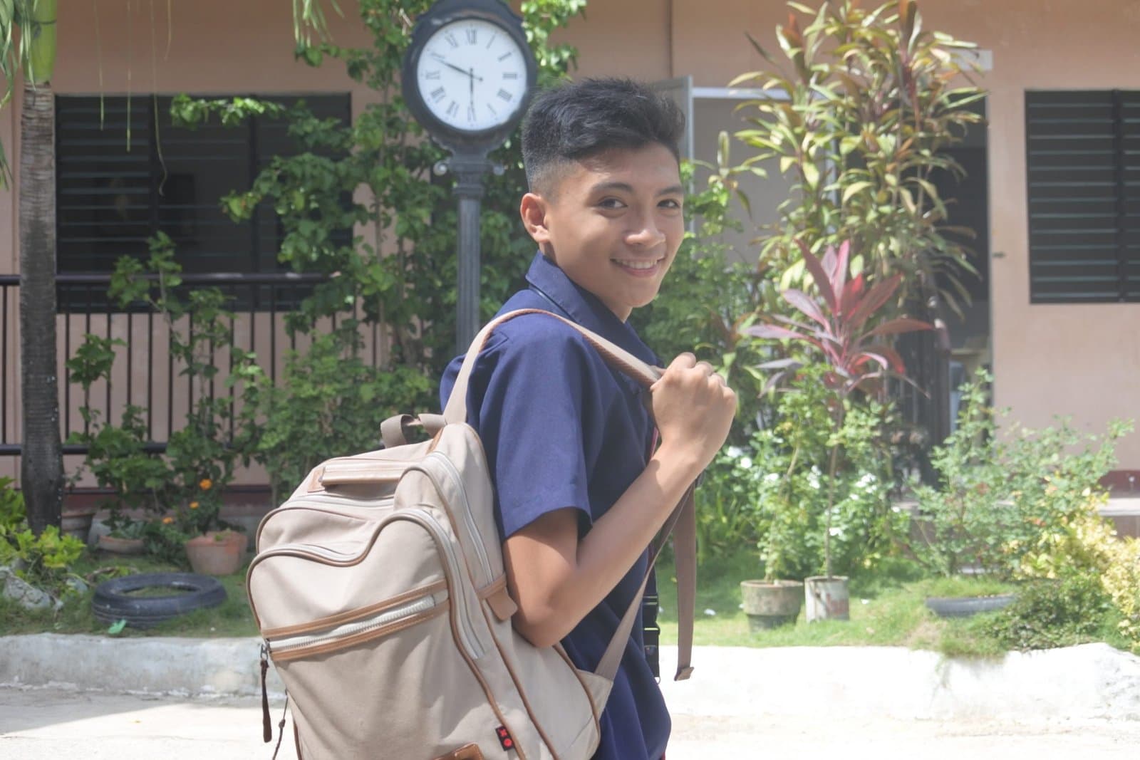 RHMC legacy photo: Student portrait on campus walkway